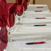 Arrangement of pens, papers, and napkins