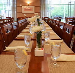 Set tables at Oros Dining Room